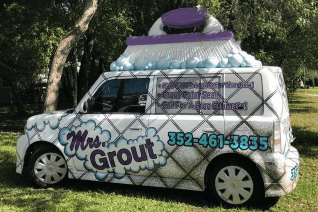 Updated Grout Mobile, topped with a scrubbing brush.