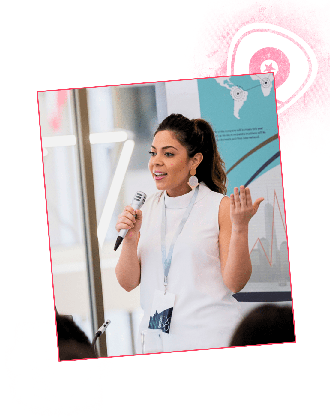 a confident woman speaking in front of an audience
