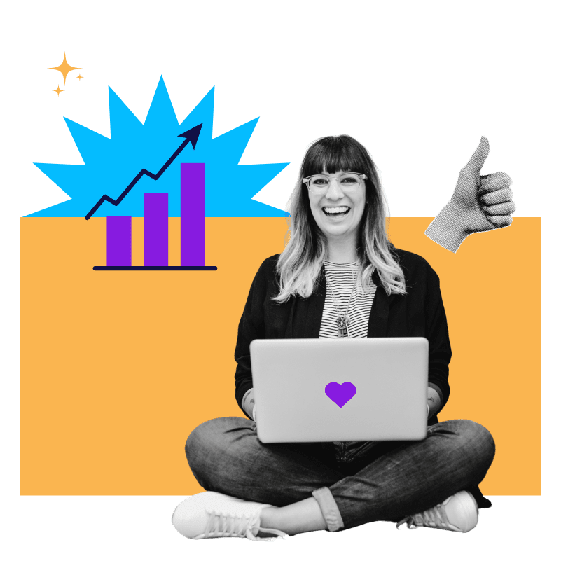 a smiling woman sitting on the floor with a laptop open on her lap