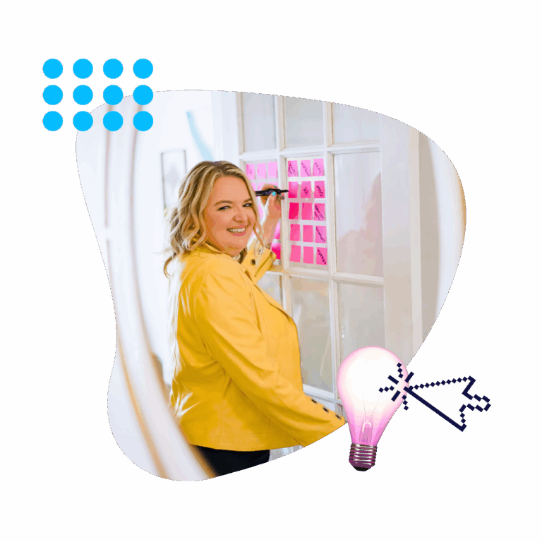 Renia writing on sticky notes posted on a window