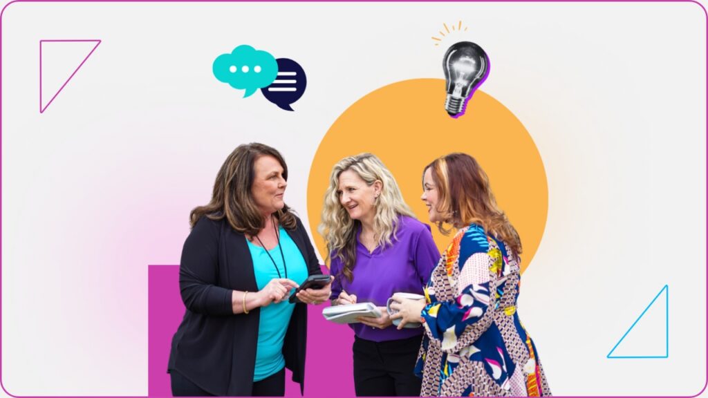 Three women talking, holding notebooks and phones, symbolize collaboration in referral-based marketing