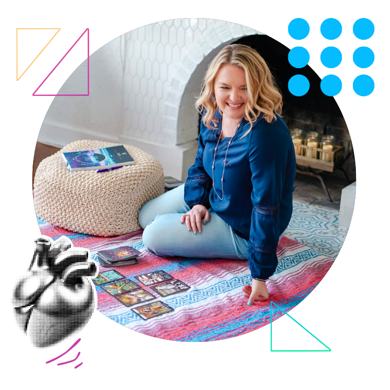 Illustration of Renia, founder of Realign Consulting, smiling while sitting on the floor reviewing strategy cards. Heart and geometric graphic elements surround the scene, symbolizing values-driven leadership, reflection, and intentional business strategy.